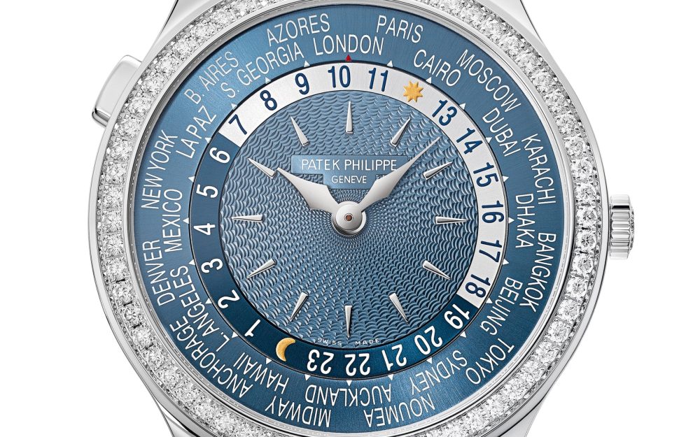 Patek Philippe Women’s Complication World-Time, 18k White Gold set with 89 diamonds (~1.03 ct.), 36mm, Ref# 7130G-016